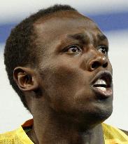 Bolt rewrites world record for men's 100m