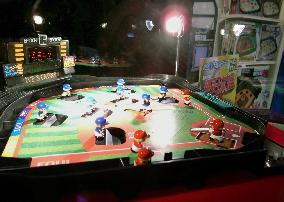 Manual baseball game still a hit in Japan