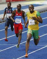 Bolt wins men's 200-m with new world record