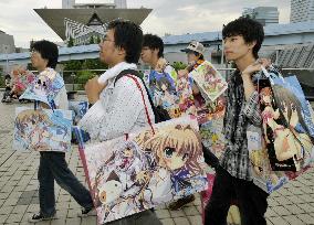 Participants carry bags with anime, game characters