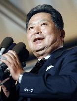 Ex-Chief Cabinet Secretary Nakagawa narrowly wins reelection