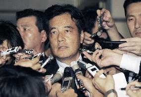 DPJ's Okada speaks to reporters