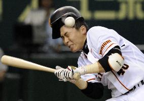 Yomiuri's catcher Kato hit by pitch