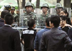 People, police in Urumqi