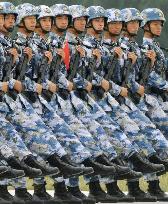 Chinese soldiers practice for parade