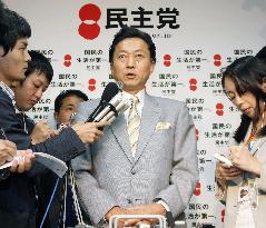 Hatoyama speaks to reporters