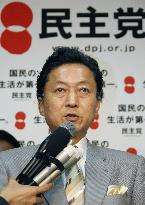 Hatoyama speaks to reporters