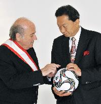 Hatoyama meets FIFA chief Blatter