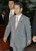 Defense minister Kitazawa arrives at premier's office