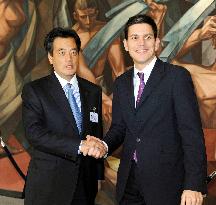 Okada meets with Miliband