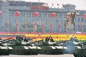 Beijing shows off new weaponry in 60th anniversary parade