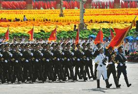 Beijing shows off new weaponry in 60th anniversary parade