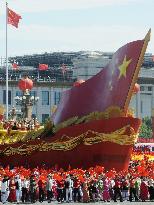 Beijing shows off new weaponry in 60th anniversary parade