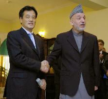 Okada meets with Karzai in Kabul