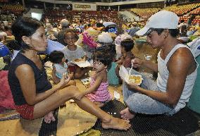 Evacuees after typhoons in Philippines