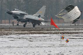 China Jian-10 jet lands at airfield