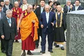 Dalai Lama attends memorial service for war dead in Okinawa