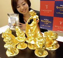 Tanaka Kikinzoku unveils gold Disney Snow White, dwarf figurines