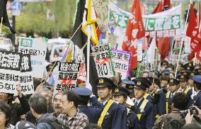 200 people against 20th anniversary of emperor's enthronement