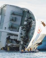 Overturned Japanese ferry inspected