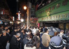 Families pray for victims in fire at Busan indoor shooting range