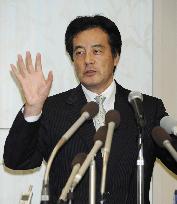 Okada speaks to press in Okinawa