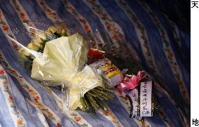 Flowers offered at Busan shooting accident site