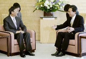 Yang, Hatoyama meet