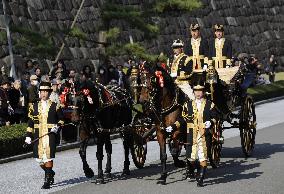 Ceremonial horse-drawn carriage runs in imperial garden