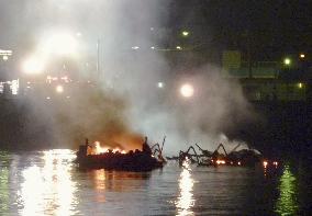 Tokyo excursion boat gutted by fire