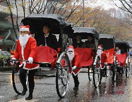 Santa rickshaws take to Tokyo streets