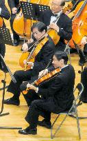Crown prince plays viola at concert