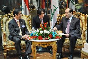 Japan official, Iraq PM meet at airport