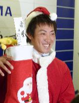 BayStars' Uchikawa merry with his doubled salary