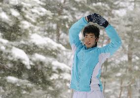 Rookie pitcher Kikuchi works out despite snow