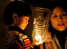 Child in anti-U.S. base rally in Okinawa