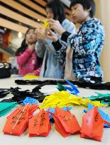 Paper cranes carry messages for Japanese Olympic athletes