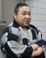 Ex-ozeki Chiyotaikai hangs up mawashi