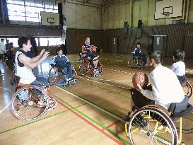 Non-handicapped are drawn to wheelchair basketball