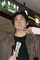 Chinese activist at Narita airport allowed to return home
