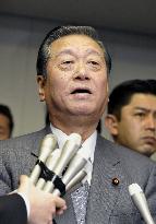 Ozawa says he will stay on despite indictment of aides