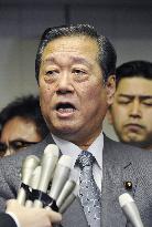 Ozawa says he will stay on despite indictment of aides