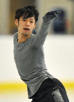 Men's figure skaters practice in Vancouver