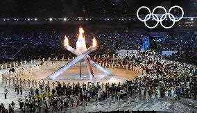 Olympic flame lit at opening ceremony