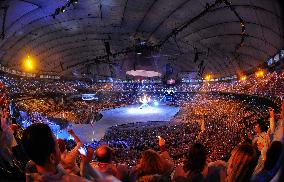 Olympic flame lit at opening ceremony