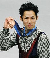 Japan's Takahashi wins men's figure skating bronze