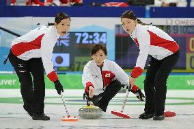 Japan curling team plays against Britain