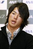 Japanese teenage golfer Ishikawa returns home