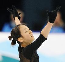 Asada prepares for another triple axel in free skate