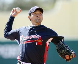 Braves Saito practices pitching at spring training